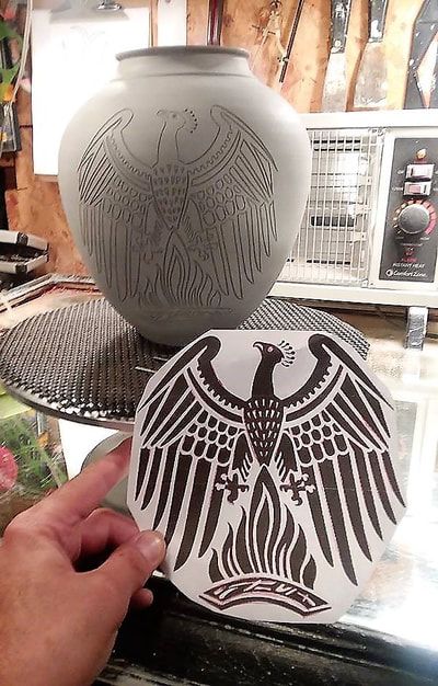 copy of a Phoenix getting ready to be carved in clay