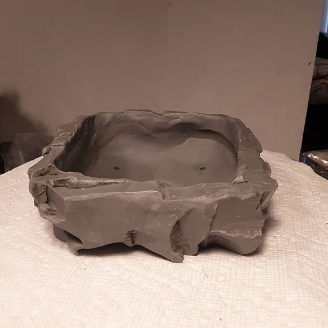 Rock style ceramic bonsai in process of making