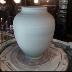 Clay piece on the potters wheel 