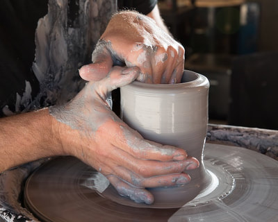 Matthew Kennedy Throwing on the potters wheel
